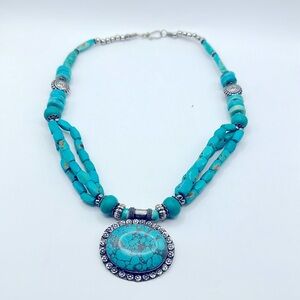 Vintage three strand turquoise pendant with silver plate plated back